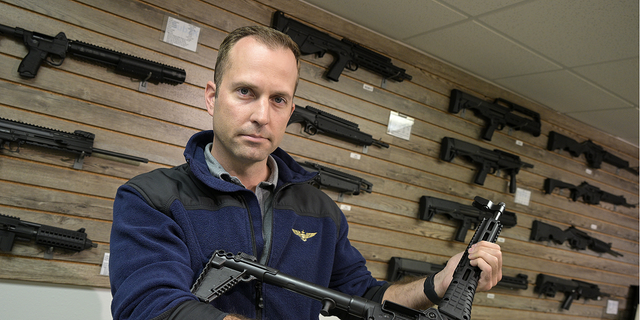 American gun companies are helping Ukrainians fight back against Putin Adrian Kellgren, director of industrial production of KelTec, holds a 9mm SUB2000 rifle, similar to ones being shipped to Ukraine, at their manufacturing facility on Thursday.